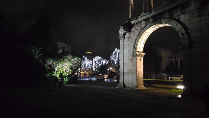 Hadrian's Arch with Christmas lights in the background